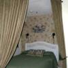 The bedroom has a queen size bed and decorated to give you that tropical feeling.
