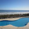 Looking over the balcony you can see both of best worlds; the pool and the ocean.